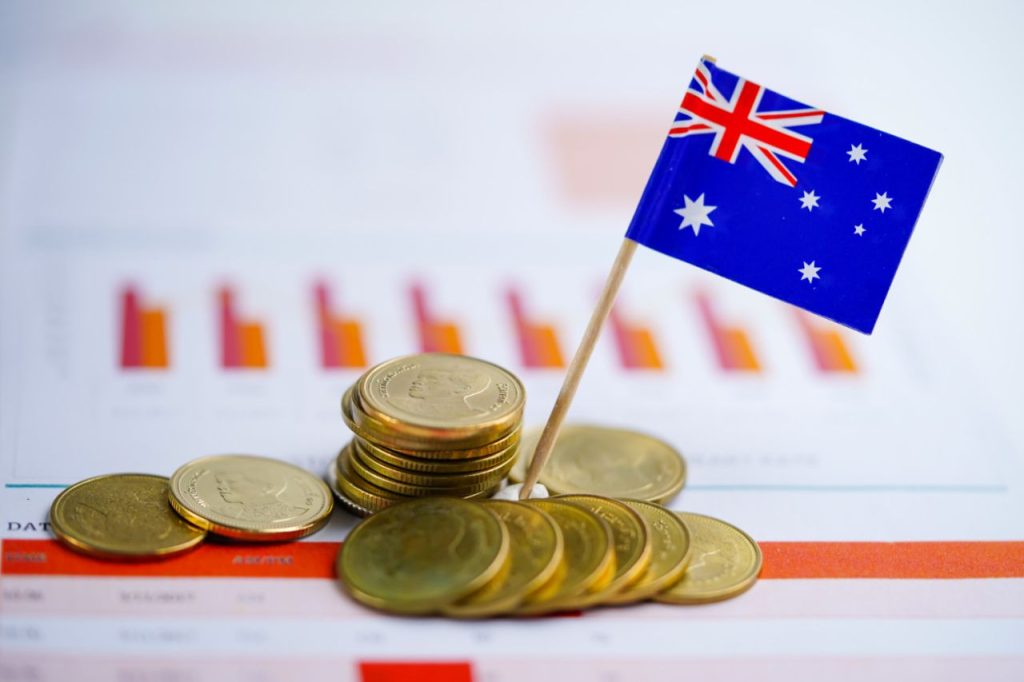 australia-flag-with-coins-graph-background
